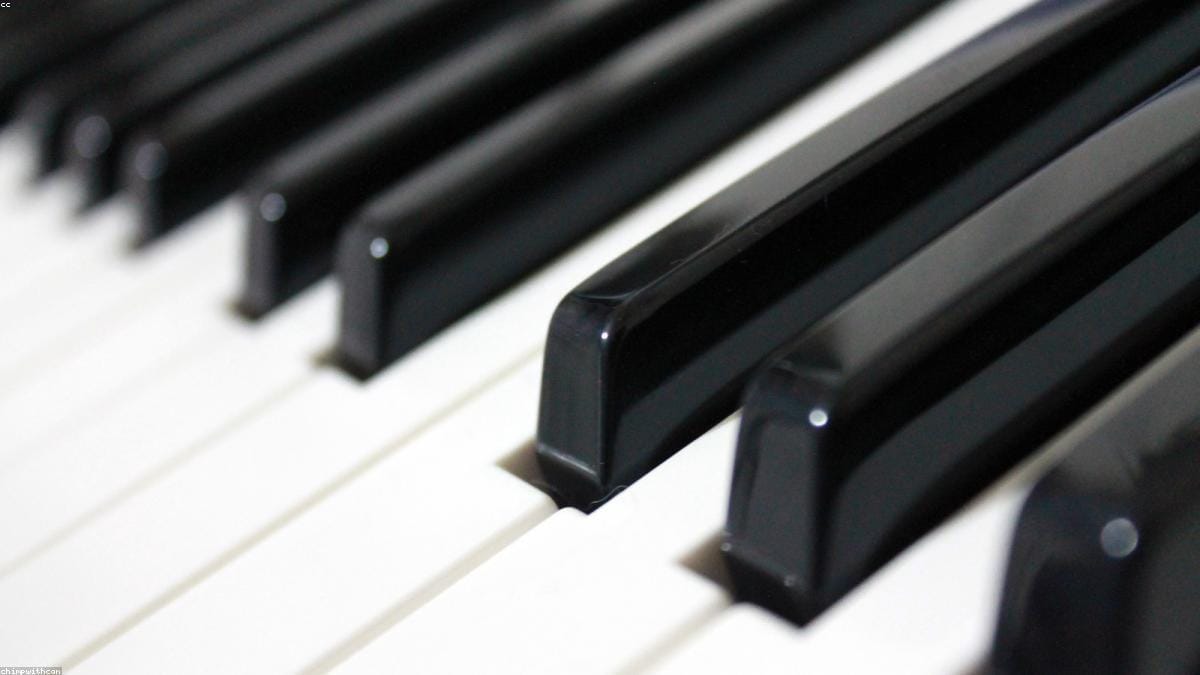 Playing Happy Birthday on the piano